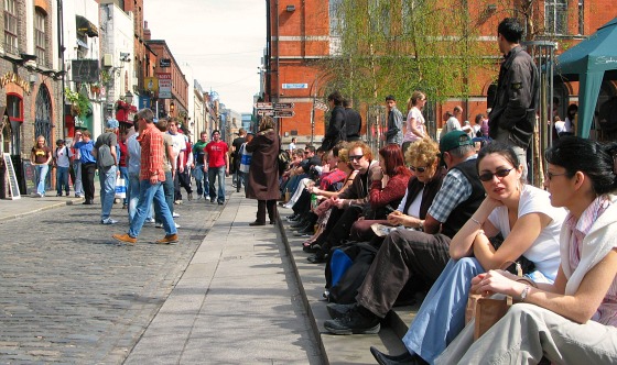 Temple Bar Square crowded on a summer's Day facing north