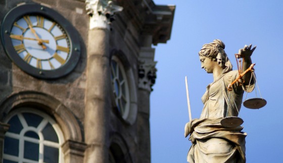 Close up of Clock Tower and Justice Statue at Dublin Castle